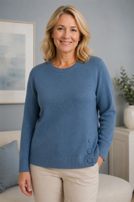 Lun Marinello dame strik i meleret denimblå med sølvglimmer på rib og hals.