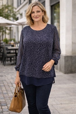 Sortt ciffon med hvide prikker